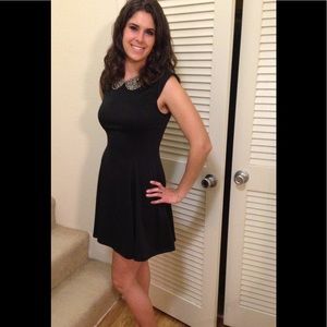 Little black dress with some flare.